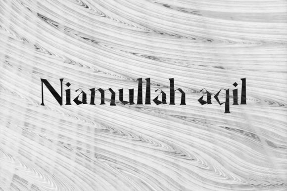 Niamullah Aqil: The Edgy Script Font Redefining Modern Brand Identity